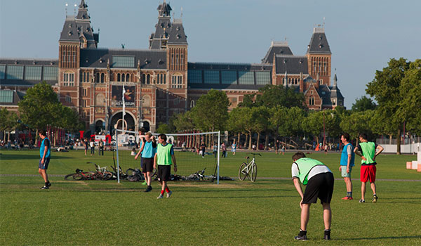 play football in amsterdam-featured