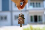 keys with a house keychain representing buying a house in the netherlands with mortgage