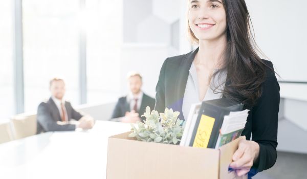 A woman happily quitting her job