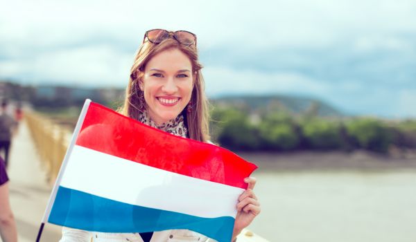 a woman with dual citizenship in the netherlands