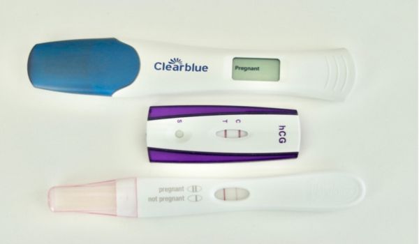 two pregnancy tests one on top of the other