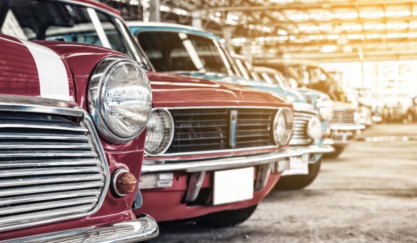 a row of vintage cars in the netherlands