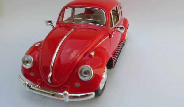 a vintage red Volkswagen beetle