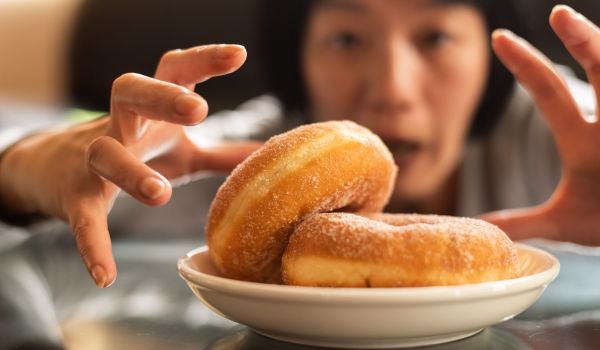 A woman wanting donuts
