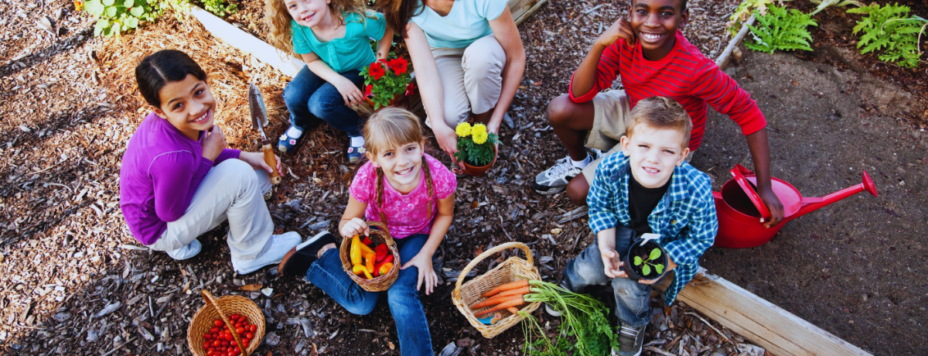 A group of children working in a community garden