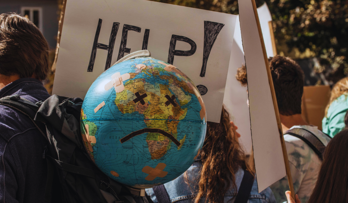 A sad globe at a climate change rally
