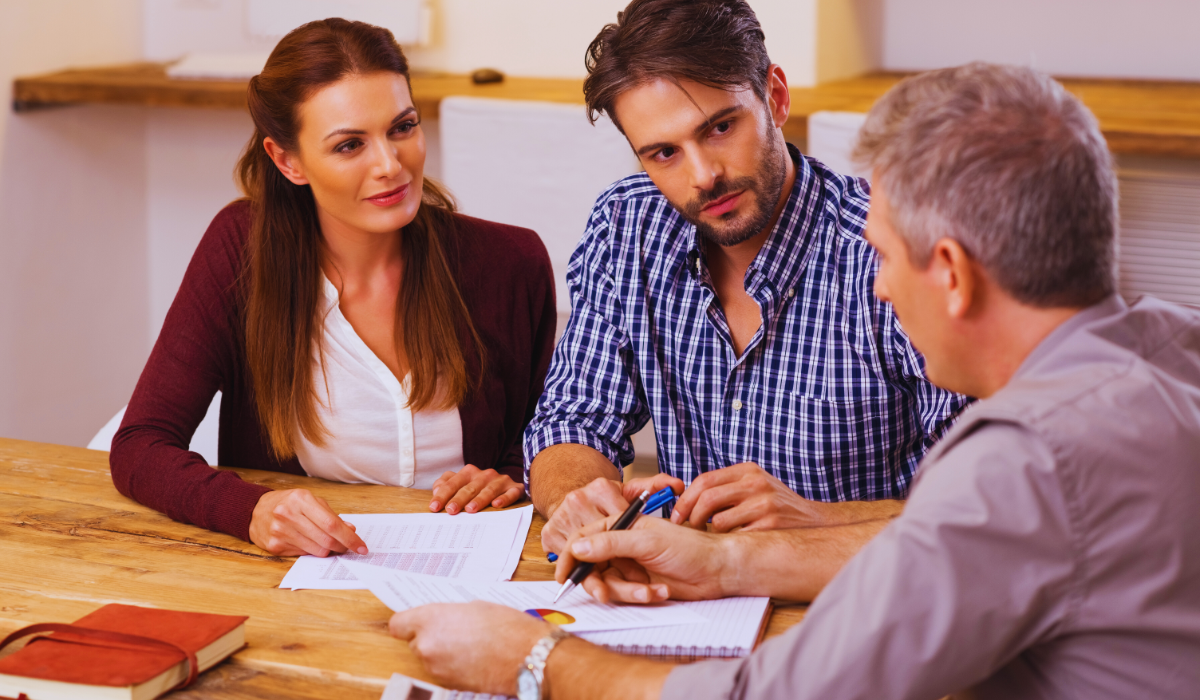 A couple meeting with a mortgage advisor