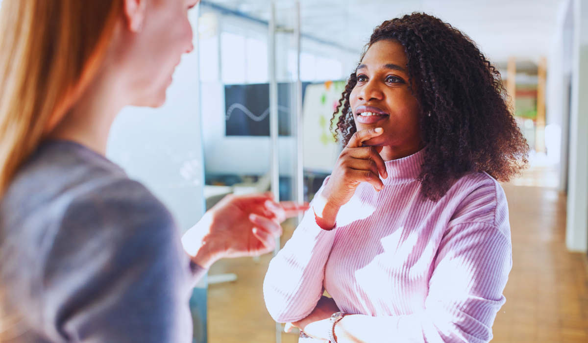 Two women engaged in small talk