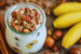Dutch breakfast of yoghurt and muesli with nuts and banana