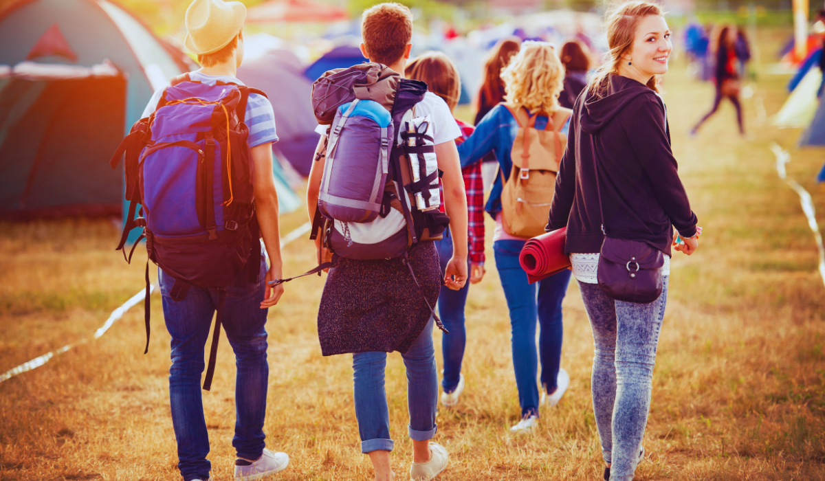 Teens at an outdoor music festival
