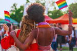 Interracial female couple at a pride parade