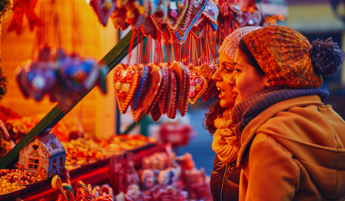 Two women enjoying a christmas market in the Netherlands