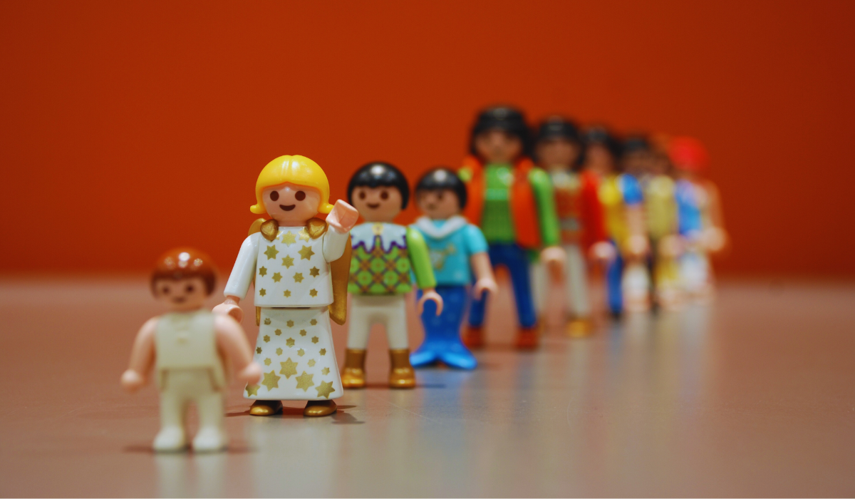 Toy figures in a queue