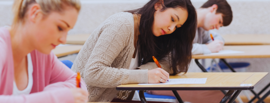 Two students taking the knm exam questions