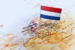 Netherlands flagged pinned ona tap, illustrating tips for first-tim expats