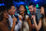 A group of friends singing at one of the best karaoke bars in the netherlands