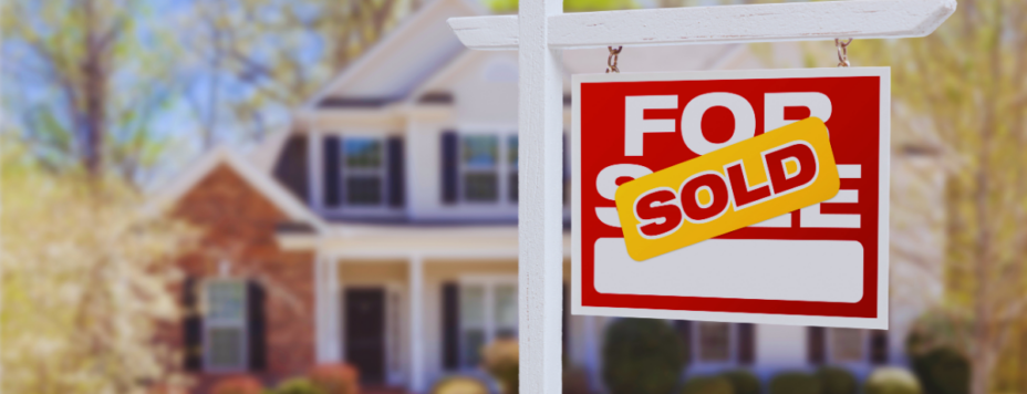 sold home for sale sign in front of new house in the netherlands