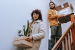 a young couple moving our of their apartment and leaving the netherlands