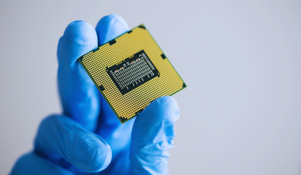 A person in the netherlands holding an AI chip in his hand