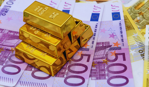gold bars set against euro notes