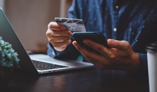 man paying and shopping e-commerce on smartphone